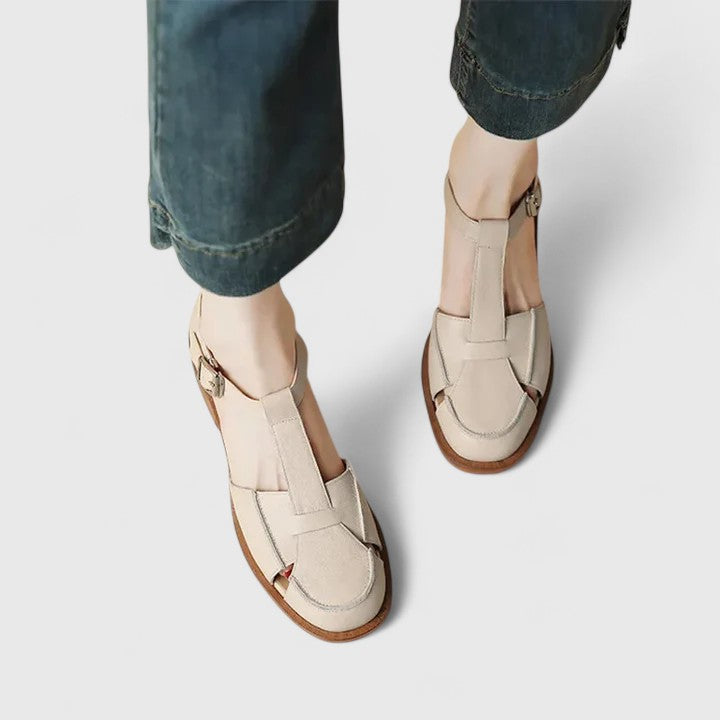 Isara | Low block heel sandals with side cut-out detail